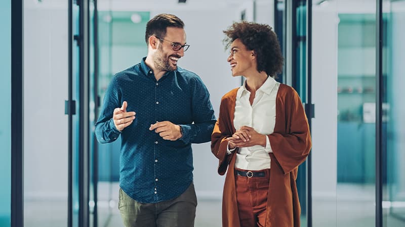 Case Study - Insights and Talent Power Consultancy's Success - Couple Of Business Persons Walking Together