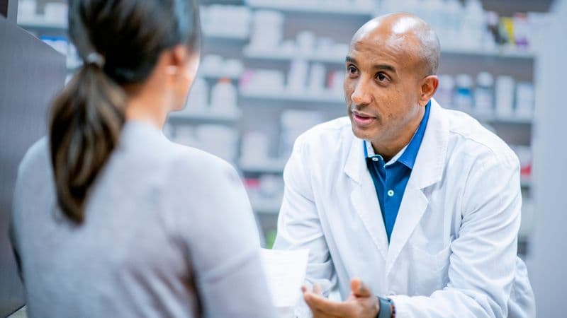 Medical professionals and pharmacists provide medication at the pharmacy.