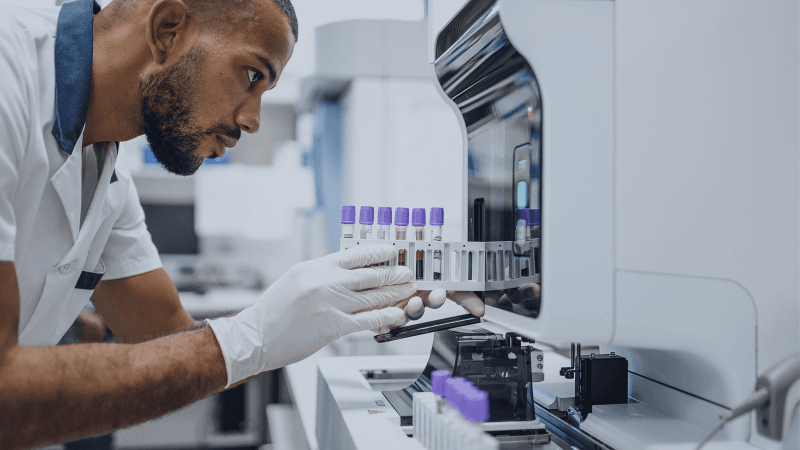 Scientist Analyzing Biological Samples During Oncology Drug Development And Launch Preparation.