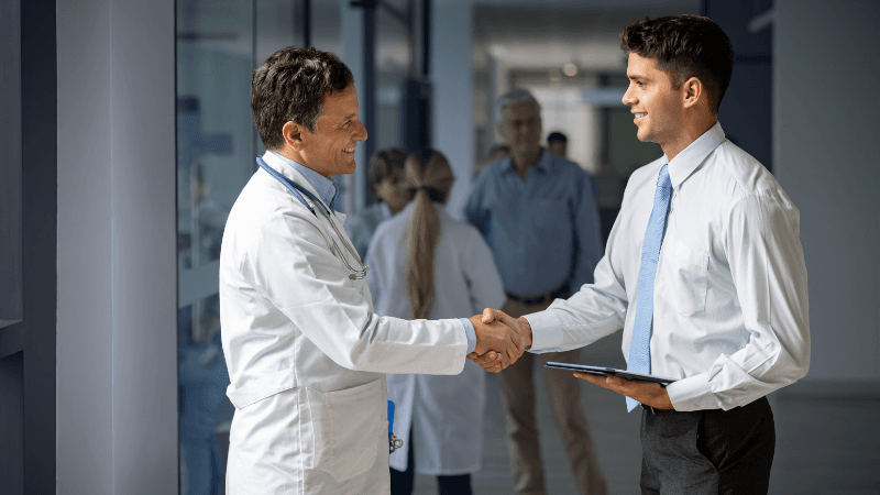 Medical Science Liaison Meeting With A Healthcare Professional In A Clinical Setting