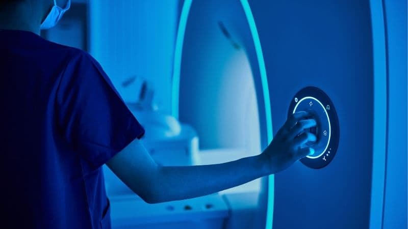 EPM Scientific Medical Devicemri Scanner Being Operated By Specialist