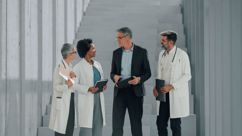 Life Sciences Executives In Discussion With Senior Pharmaceutical Professionals.